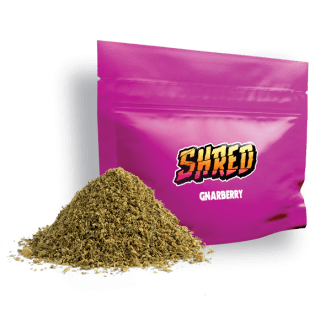 A pink bag of Shred 7 or 14 gram Gnarberry pre-milled flower.