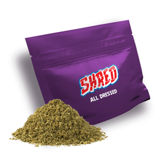 A purple bag of Shred All Dressed pre-milled flower.
